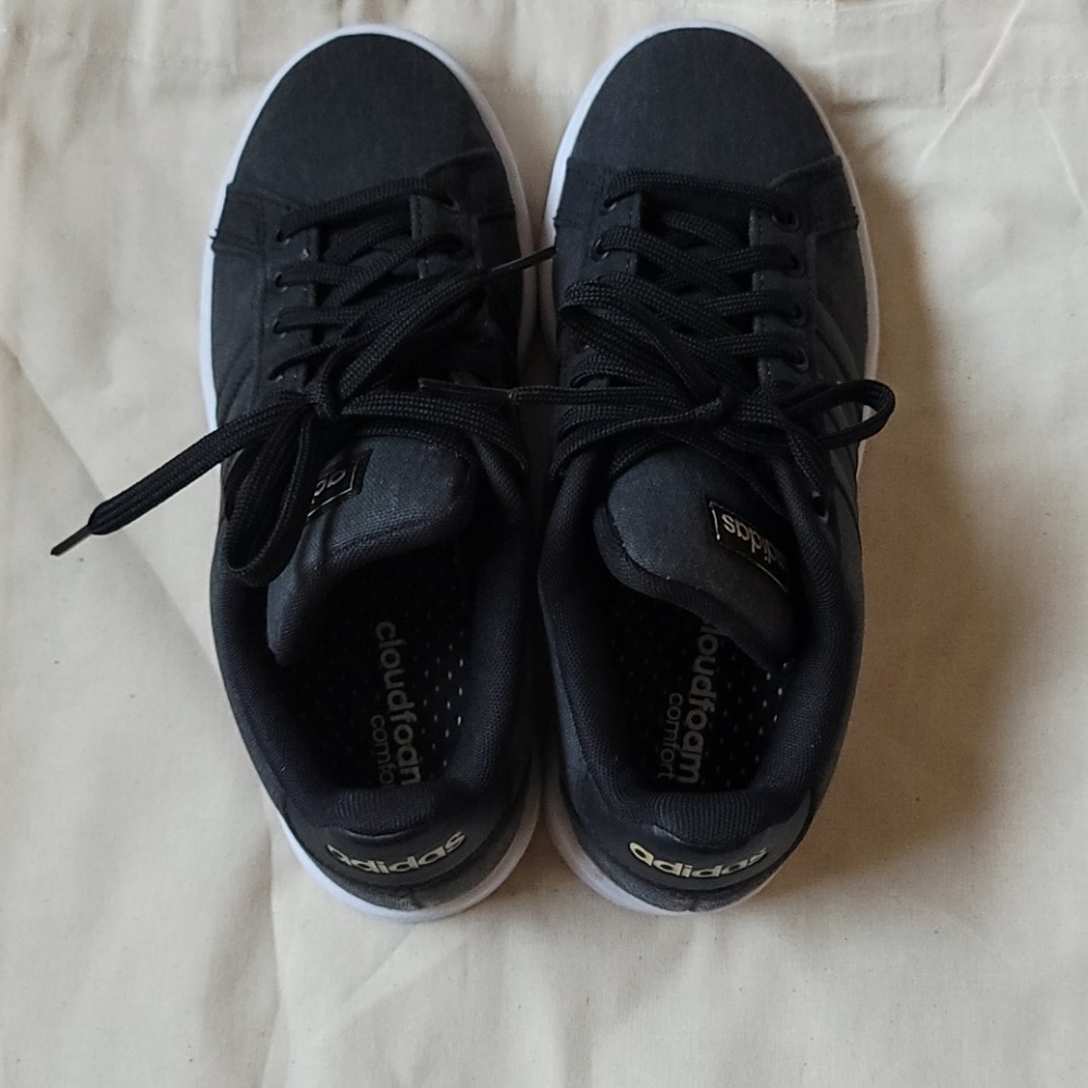 Adidas canvas sneaker with black stripes